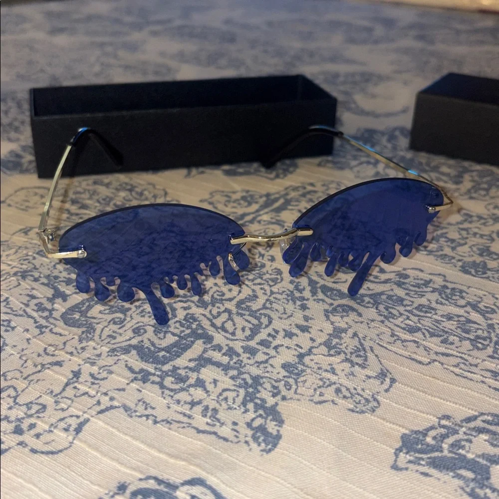 New in box teardrop blue sunglasses